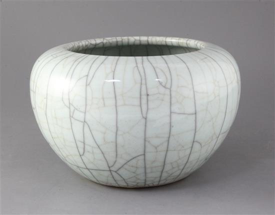 A Chinese crackle glaze alms bowl, Qing dynasty, 16.5cm high, 26.5cm diameter